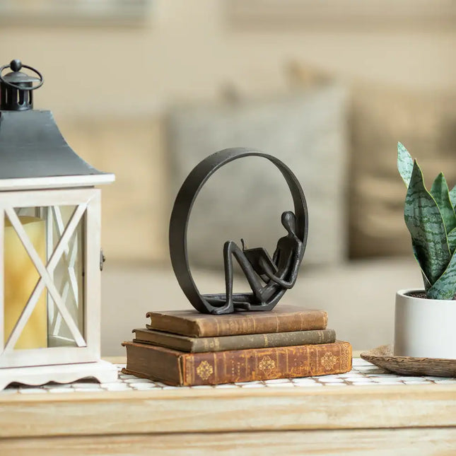 Contemporary Encircled Reader Cast Iron Sculpture – Male, Female, Dual