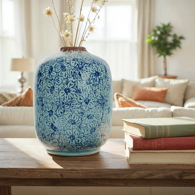 Decorative Terra-cotta Vase with Floral Pattern and Distressed Finish Accent